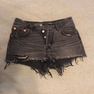 Levi’s 501 black distressed denim shorts